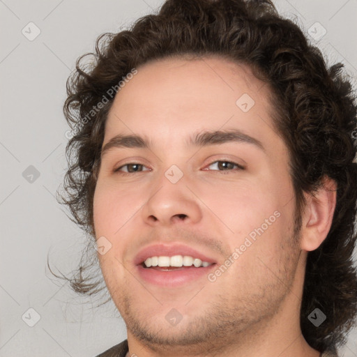 Joyful white young-adult male with medium  brown hair and brown eyes