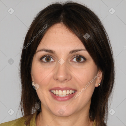 Joyful white adult female with medium  brown hair and brown eyes