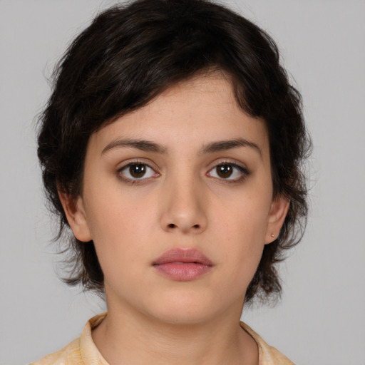 Neutral white young-adult female with medium  brown hair and brown eyes