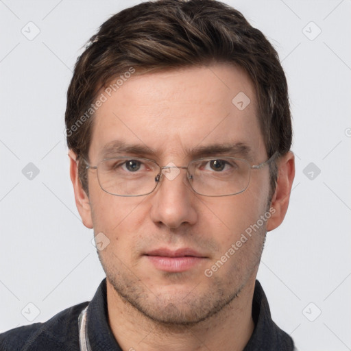 Joyful white adult male with short  brown hair and grey eyes