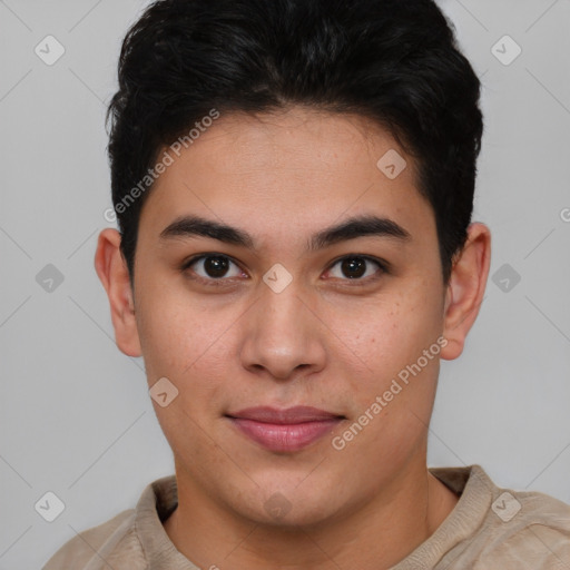 Joyful latino young-adult male with short  brown hair and brown eyes