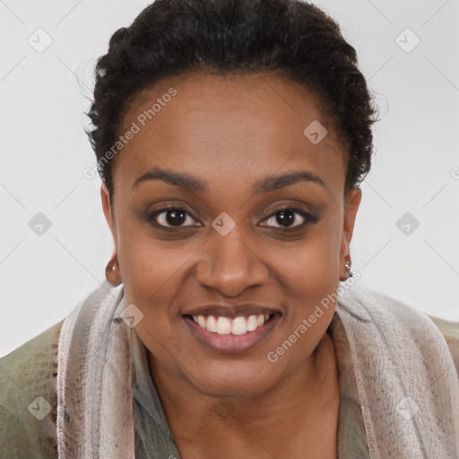 Joyful black young-adult female with short  brown hair and brown eyes