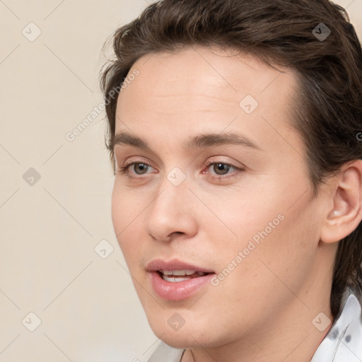 Joyful white young-adult male with medium  brown hair and brown eyes