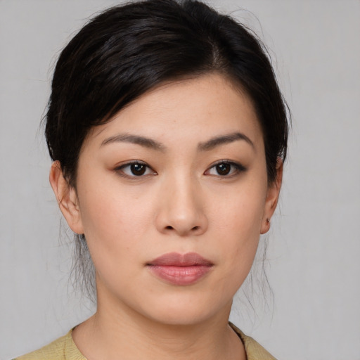 Neutral white young-adult female with medium  brown hair and brown eyes