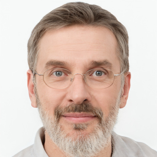 Joyful white adult male with short  brown hair and grey eyes