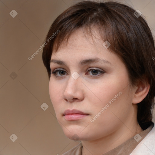 Neutral white young-adult female with short  brown hair and brown eyes