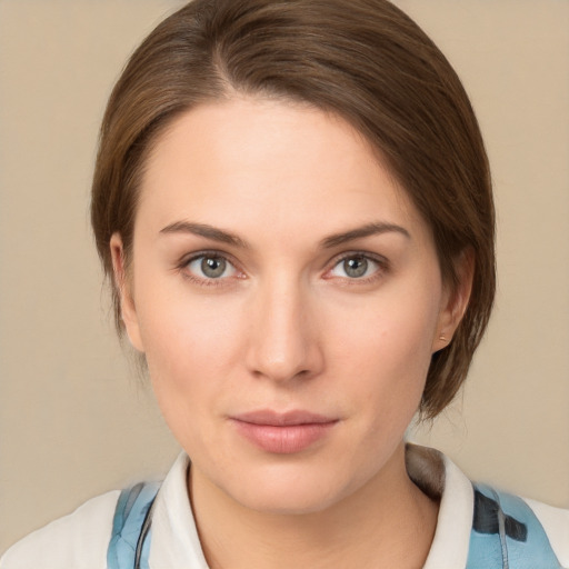 Neutral white young-adult female with medium  brown hair and grey eyes