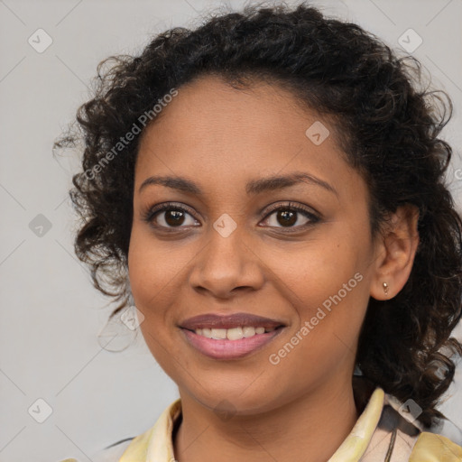 Joyful black young-adult female with medium  brown hair and brown eyes