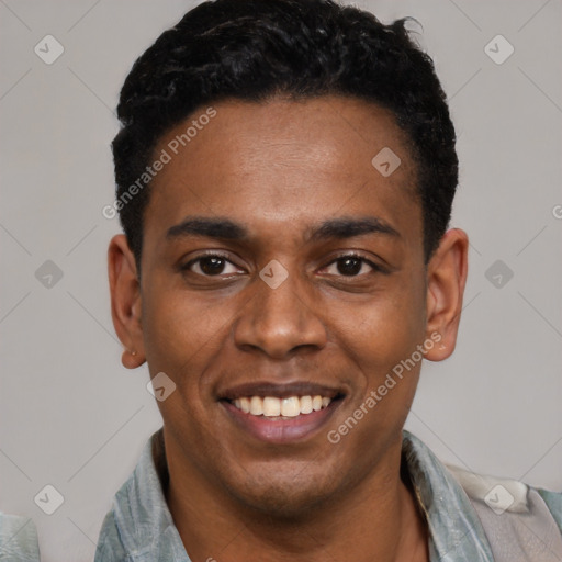 Joyful latino young-adult male with short  black hair and brown eyes