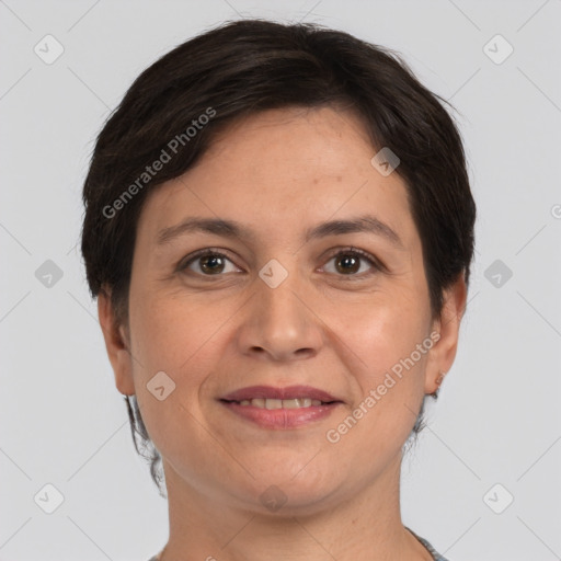 Joyful white adult female with short  brown hair and brown eyes