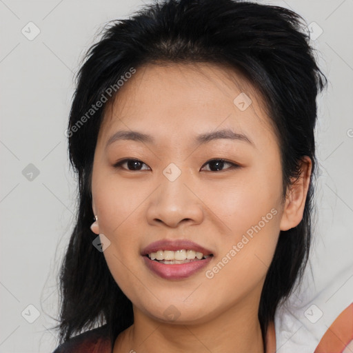 Joyful asian young-adult female with medium  black hair and brown eyes