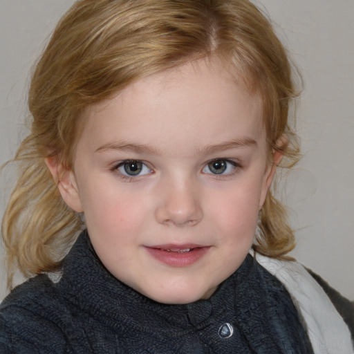 Joyful white child female with medium  brown hair and blue eyes