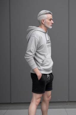 Albanian adult non-binary with  gray hair