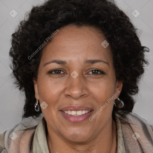 Joyful black adult female with short  brown hair and brown eyes