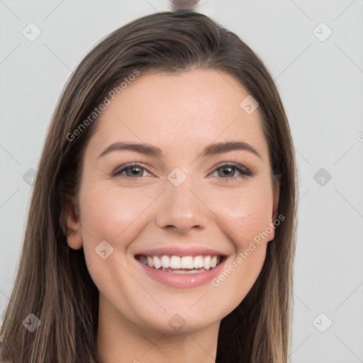 Joyful white young-adult female with long  brown hair and grey eyes