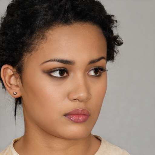 Neutral latino young-adult female with short  brown hair and brown eyes