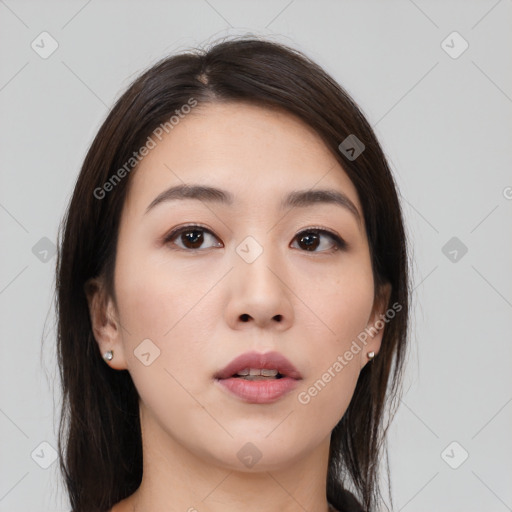 Neutral asian young-adult female with medium  brown hair and brown eyes