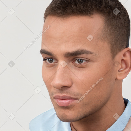 Neutral white young-adult male with short  brown hair and brown eyes