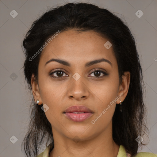 Joyful latino young-adult female with medium  brown hair and brown eyes