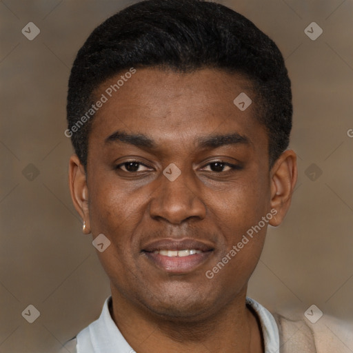 Joyful black young-adult male with short  black hair and brown eyes