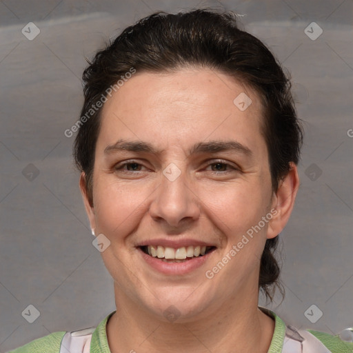 Joyful white adult female with short  brown hair and brown eyes