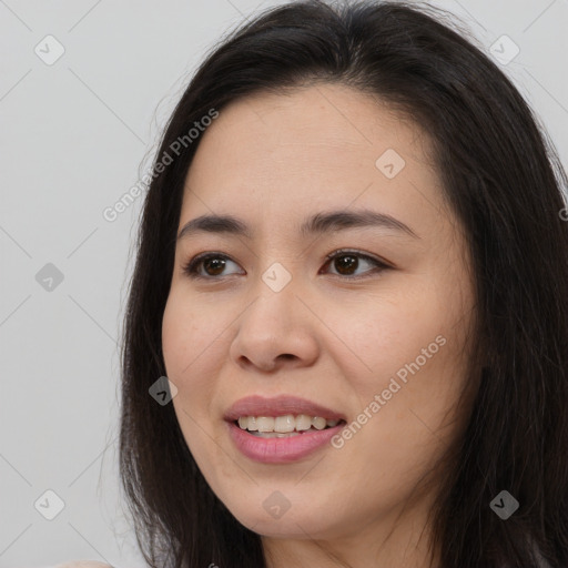 Joyful asian young-adult female with long  brown hair and brown eyes