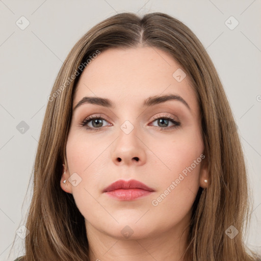 Neutral white young-adult female with long  brown hair and brown eyes