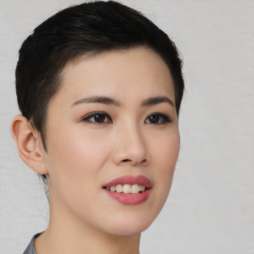 Joyful white young-adult female with medium  black hair and brown eyes