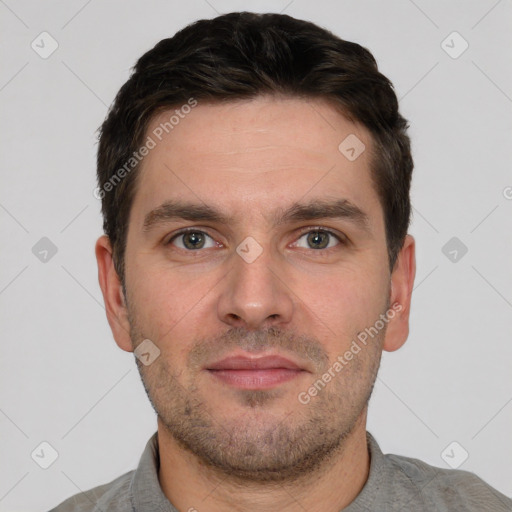 Neutral white young-adult male with short  brown hair and brown eyes