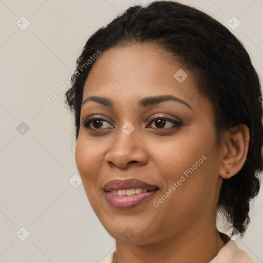 Joyful latino young-adult female with medium  black hair and brown eyes