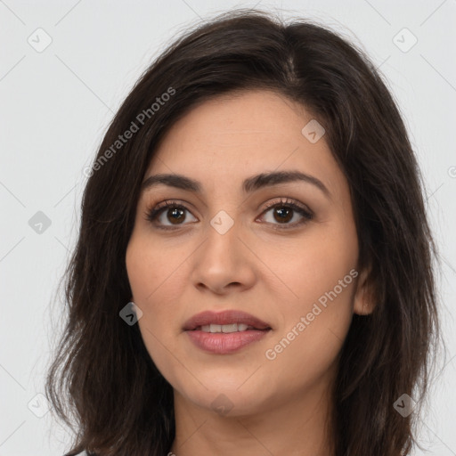 Joyful white young-adult female with long  brown hair and brown eyes