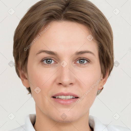 Joyful white adult female with short  brown hair and grey eyes