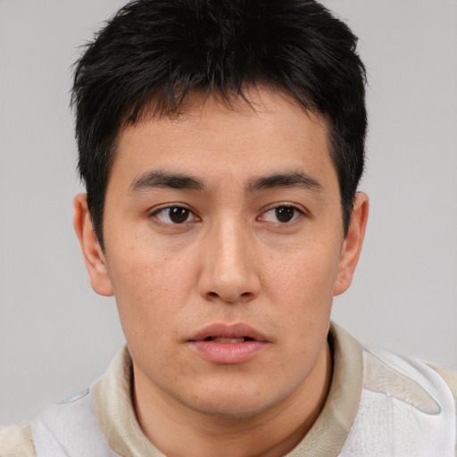 Neutral asian young-adult male with short  brown hair and brown eyes