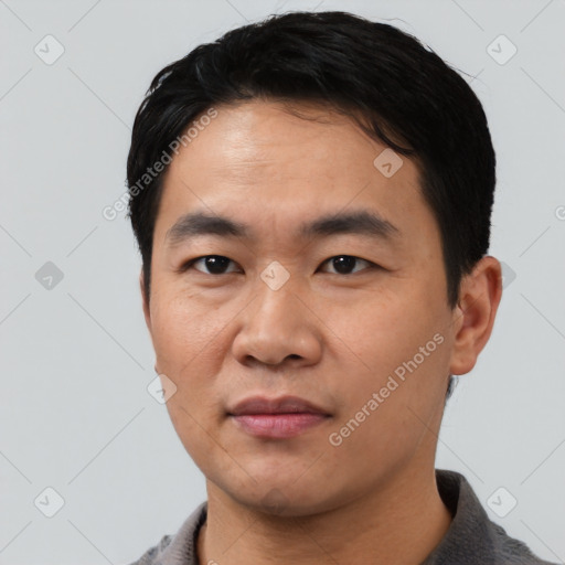 Neutral asian young-adult male with short  black hair and brown eyes