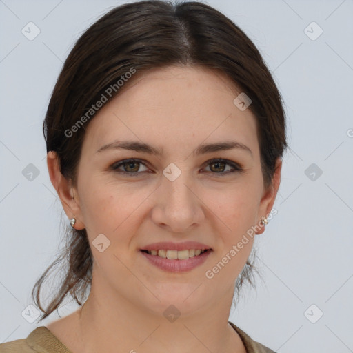 Joyful white young-adult female with medium  brown hair and grey eyes