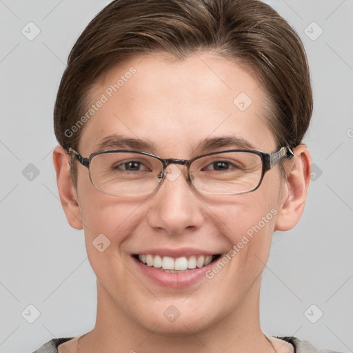 Joyful white young-adult female with short  brown hair and grey eyes