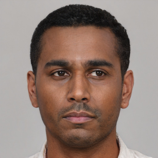 Neutral latino young-adult male with short  black hair and brown eyes