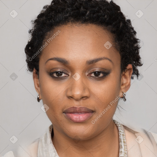 Joyful black young-adult female with short  black hair and brown eyes