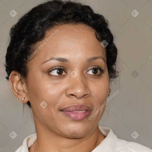 Joyful latino adult female with short  brown hair and brown eyes