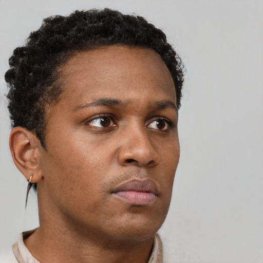 Neutral black young-adult female with short  brown hair and brown eyes