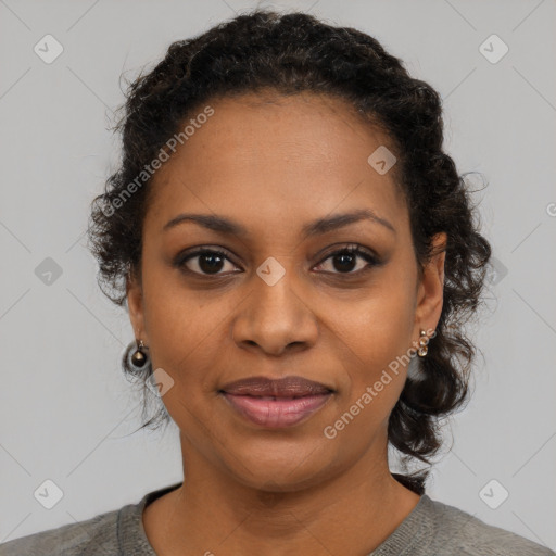 Joyful black young-adult female with medium  black hair and brown eyes