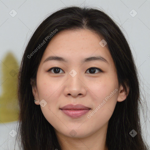 Joyful asian young-adult female with long  brown hair and brown eyes