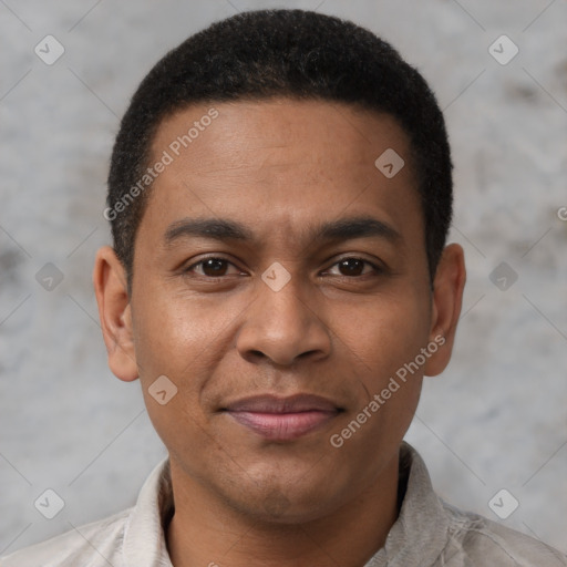 Joyful latino young-adult male with short  brown hair and brown eyes