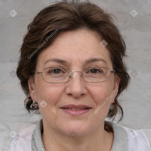 Joyful white adult female with medium  brown hair and blue eyes