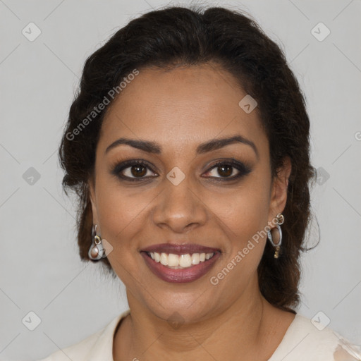 Joyful black young-adult female with long  brown hair and brown eyes