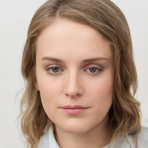 Neutral white young-adult female with medium  brown hair and blue eyes