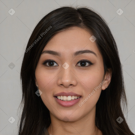 Joyful latino young-adult female with long  brown hair and brown eyes