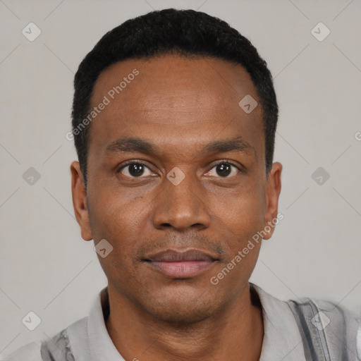 Neutral black young-adult male with short  black hair and brown eyes