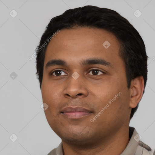 Neutral black young-adult male with short  black hair and brown eyes