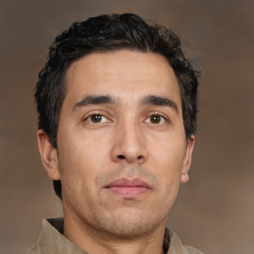Neutral asian adult male with short  brown hair and brown eyes